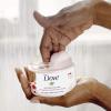 imageDove Exfoliating Body Polish Body Scrub Crushed Almond and Mango Butter 4 Count Exfoliating Scrub for Dry Skin Gently Exfoliates to Reveal Healthy Skin 105 ozPomegranate